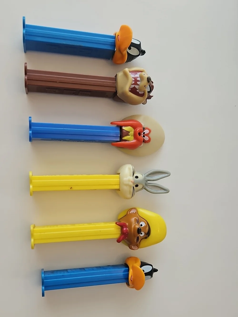 Vintage-Classic Cartoon Character PEZ Candy Dispensers - Blue, Yellow, Brown